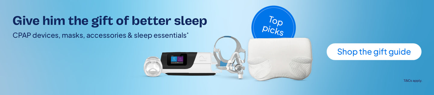 Promotional banner with text 'Give him the gift of better sleep'. The image features a CPAP device, CPAP mask and contoured sleep pillow with a 'Top picks' badge and a 'Shop the gift guide' button on a blue gradient background.