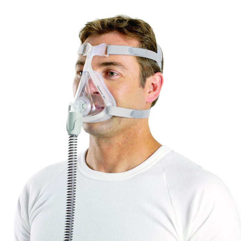 man using ResMed Quattro Air Full Face CPAP Mask connected to the tube