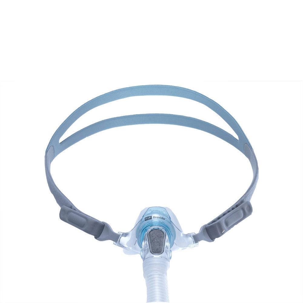 Fisher and Paykel Brevida Nasal Pillow Mask connected to tubing