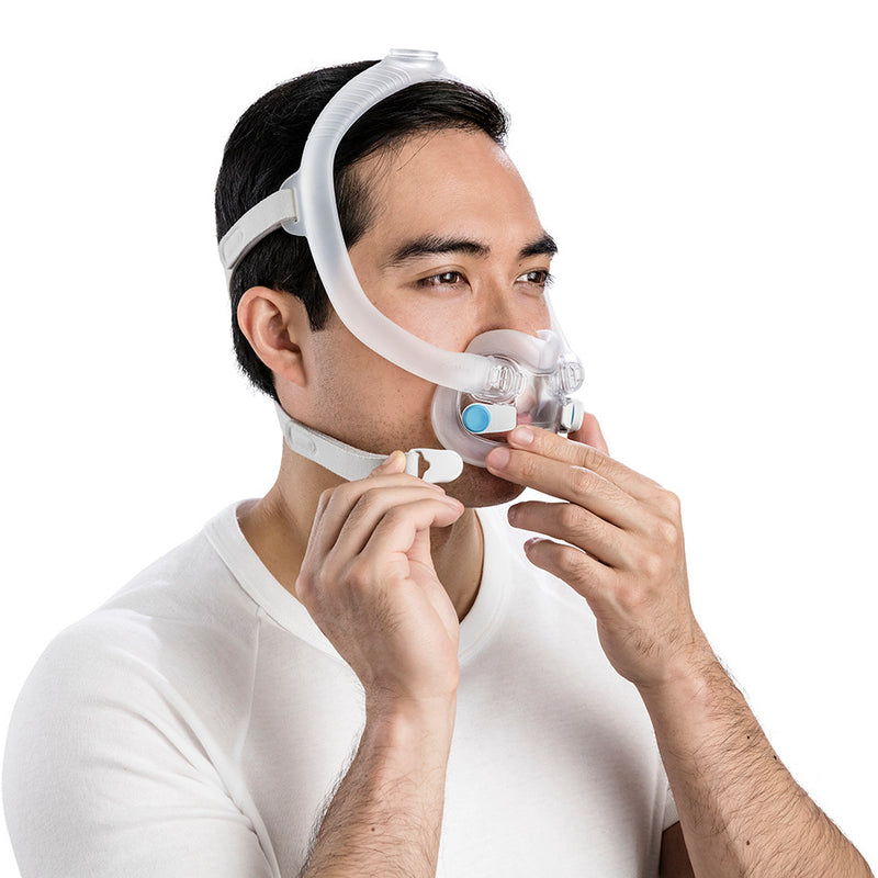 Man fitting ResMed AirFit F30i Full Face Mask