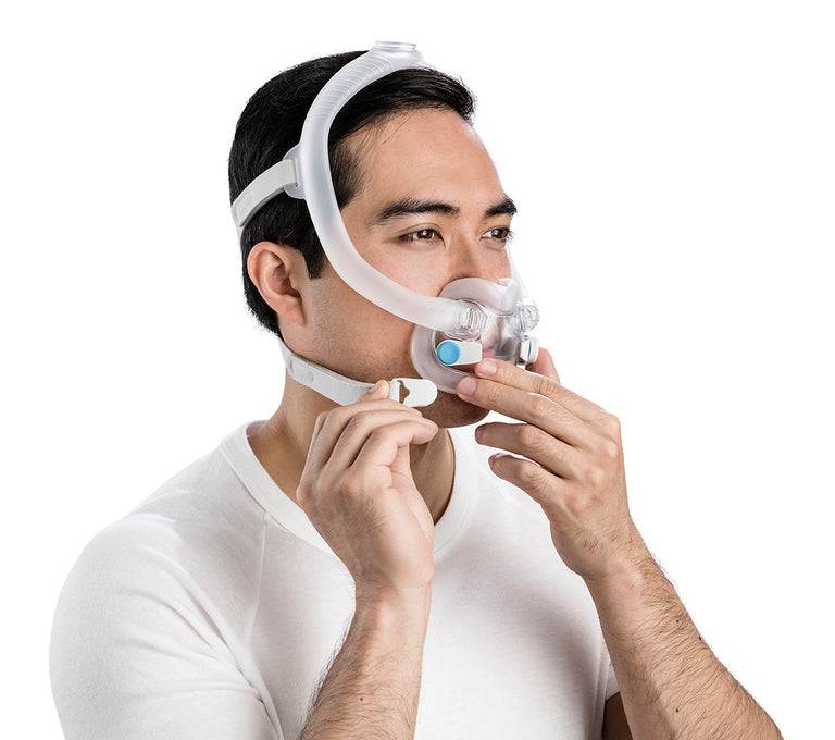 Man fitting ResMed AirFit F30i Full Face Mask